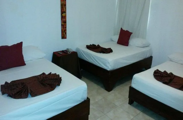 Hotel Nuevo Amanecer El Catey room 3 bed